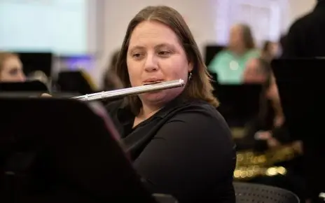 Student Playing Flute (Image Credit: Eli Hark)