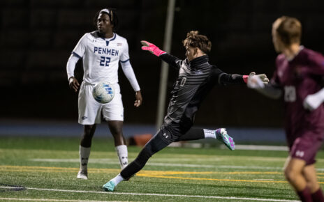 Preston Neal kicking a soccer ball