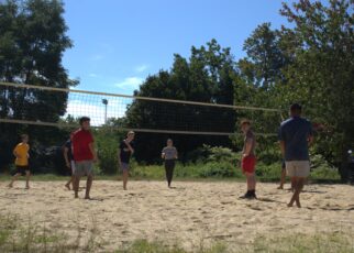 students playing volleyball