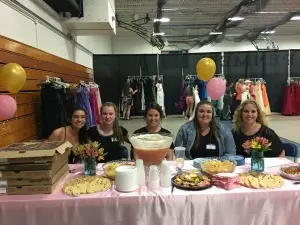 Lisa Allard, Kristy Turner, Codi Lyons, Izzy Proia and Rebecca Lariviere welcome teens to the event.