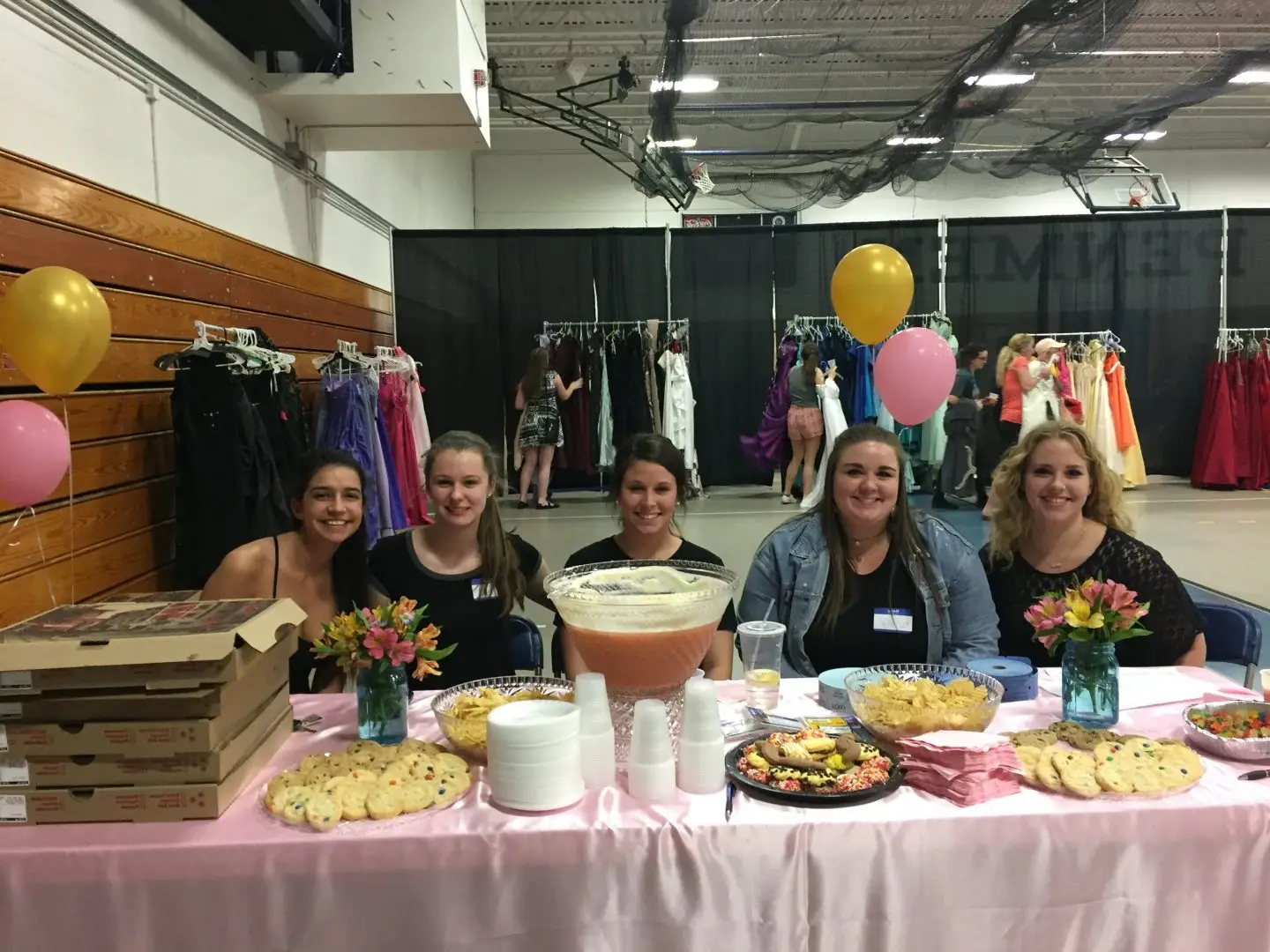 Lisa Allard, Kristy Turner, Codi Lyons, Izzy Proia and Rebecca Lariviere welcome teens to the event.