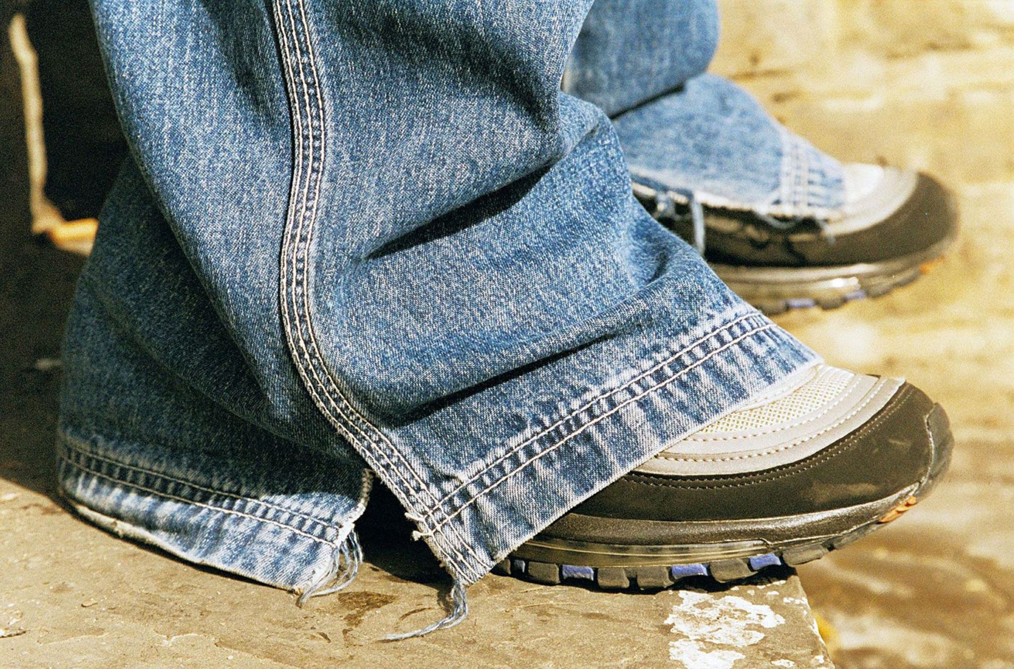 bootcut jeans and sneakers