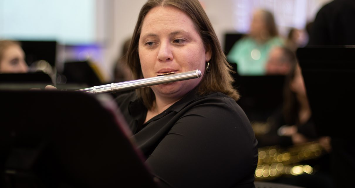 Student Playing Flute (Image Credit: Eli Hark)