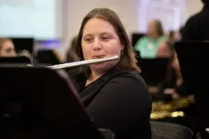 Student Playing Flute (Image Credit: Eli Hark)