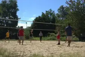 students playing volleyball